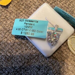 Moissanite Heart Pendant with Silver Accents